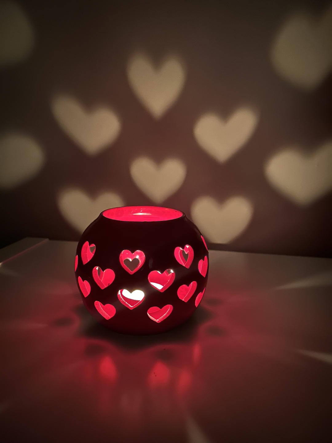 Charming Red Candle Holder with Heart Cutouts – $10