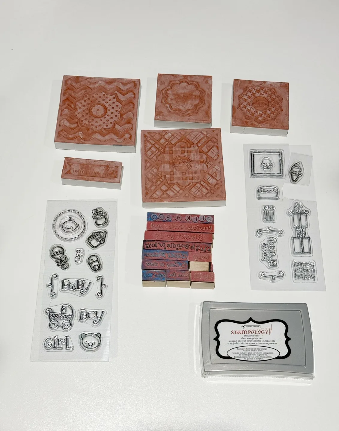 Rubber and clear stamps with unopened Stampology Ink Pad image indicator(8)