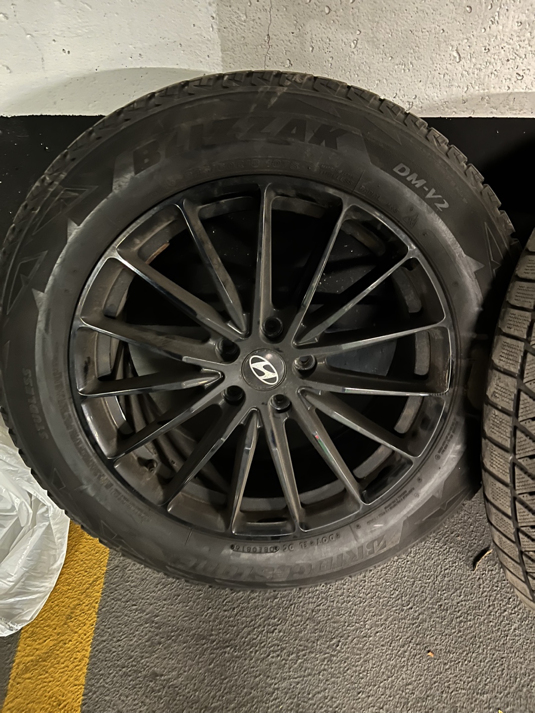 235/60R18 Bridgestone winter tire with Hyundai alloy rim