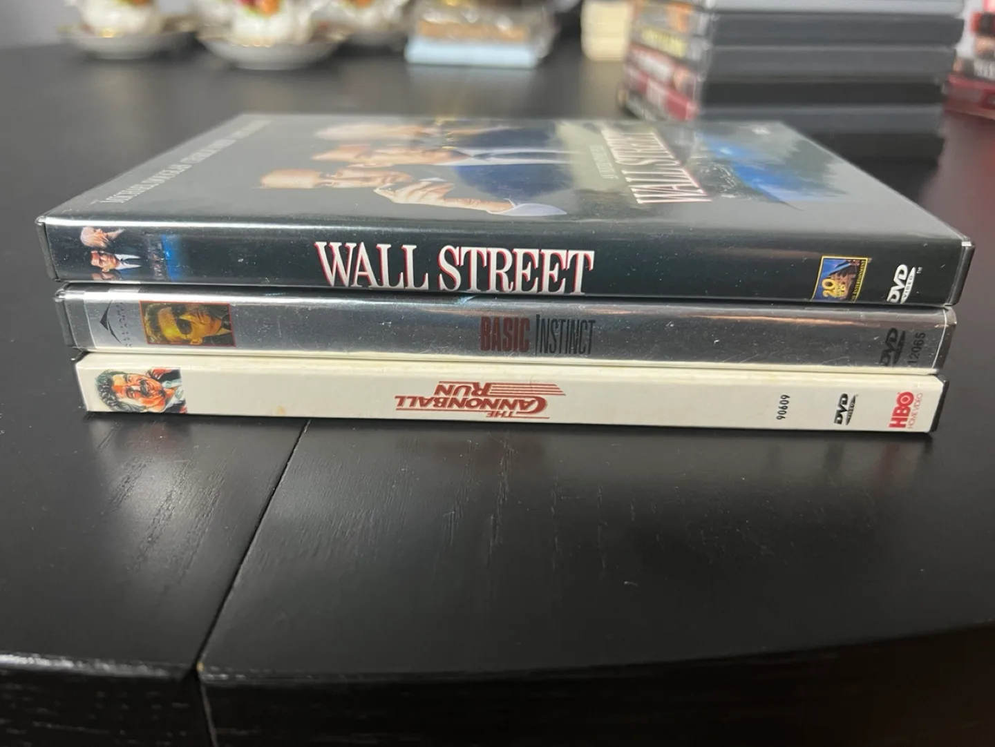 3 DVD Movies - The Cannonball Run, Basic Instinct, Wall Street image indicator(2)
