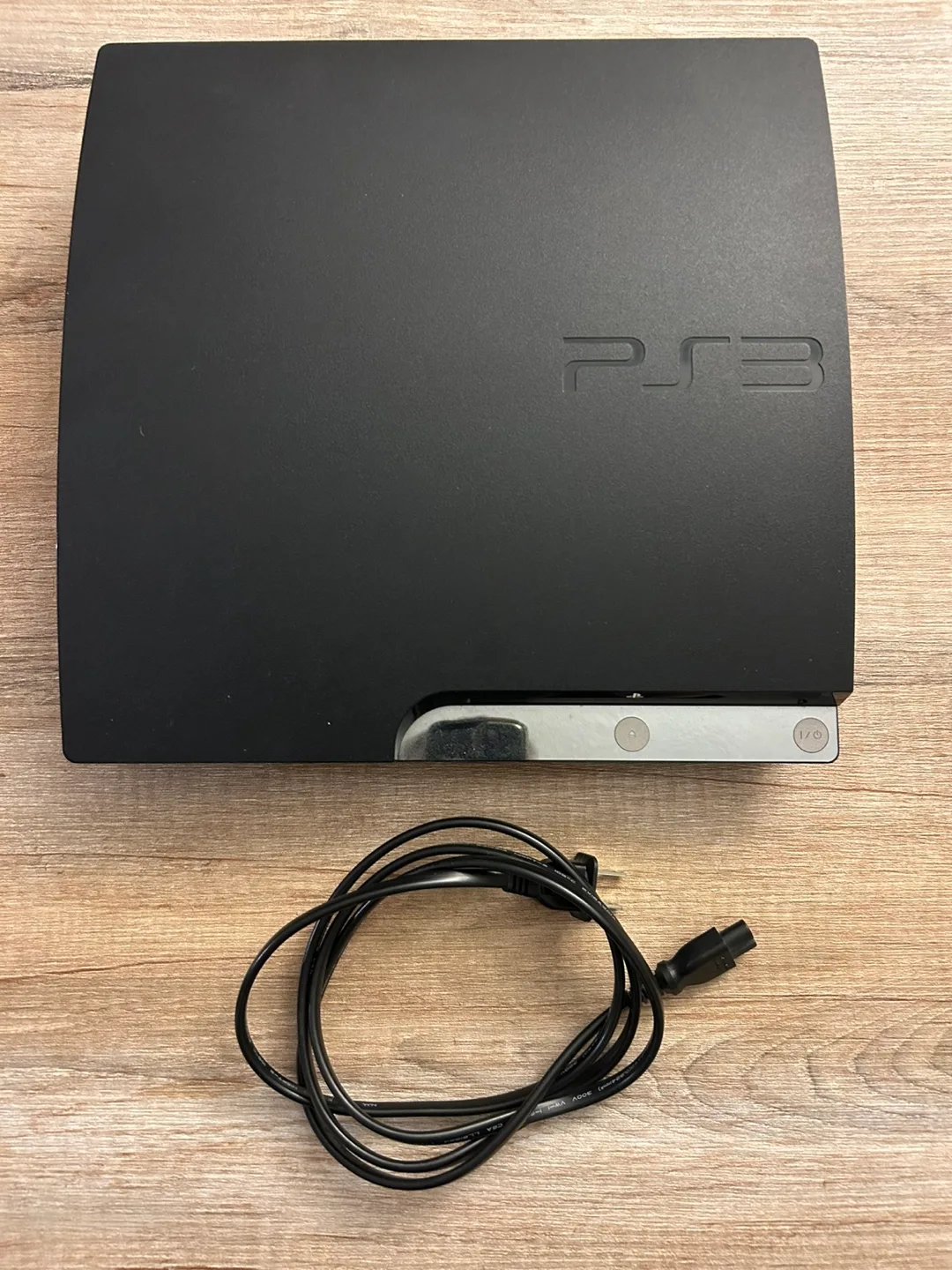 PS3 Slim Console 320gb with 11 Games and Controller thumbnail