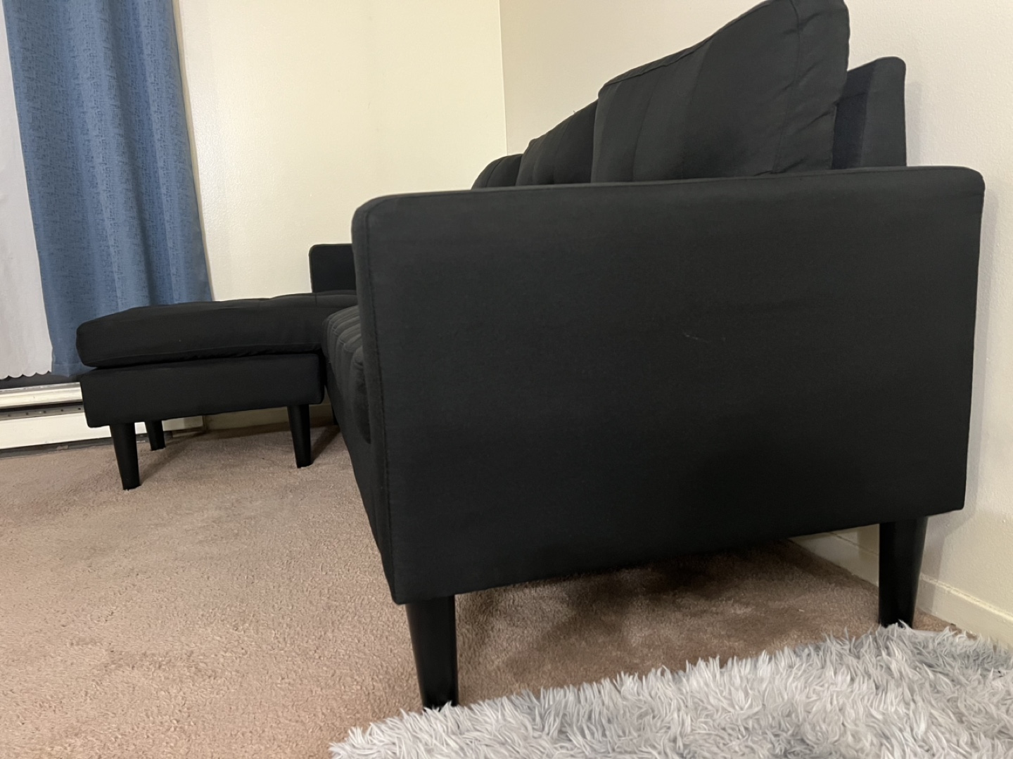 Black Sectional Sofa with Ottoman
