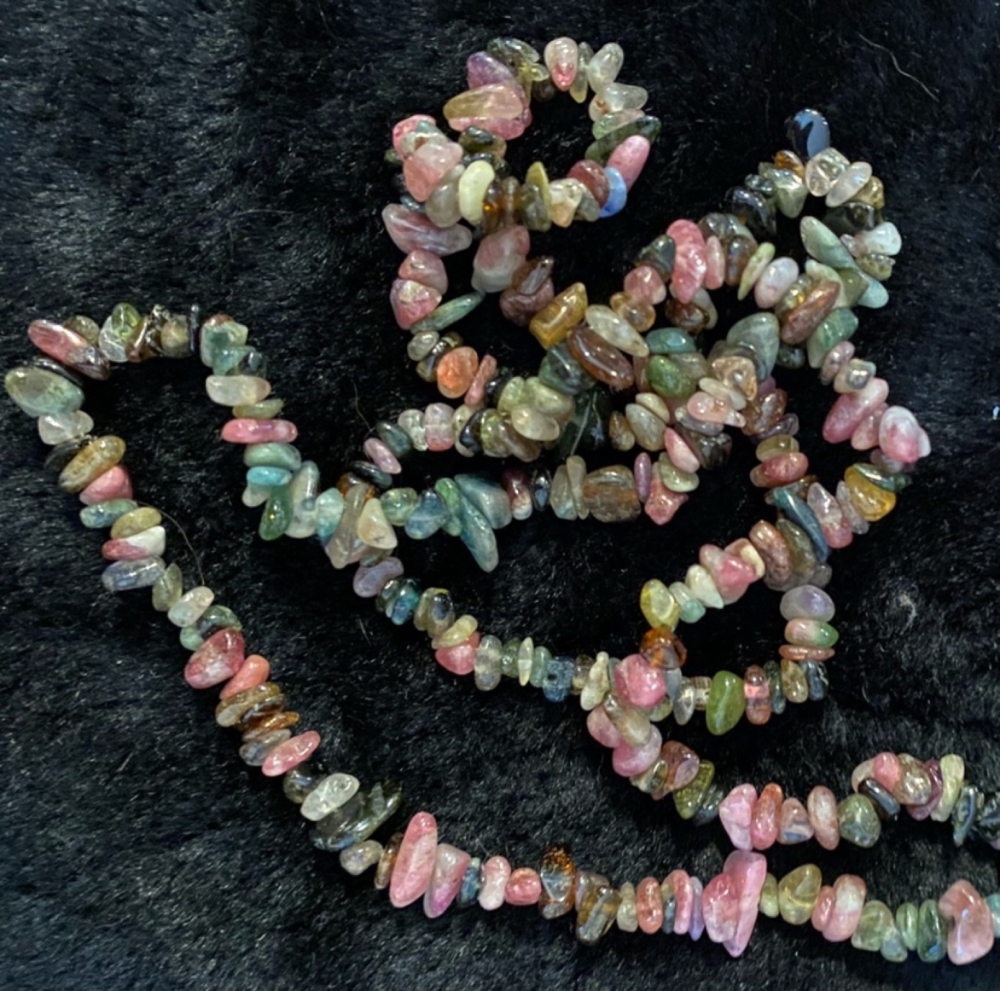 Rainbow tourmaline chip bead strand.