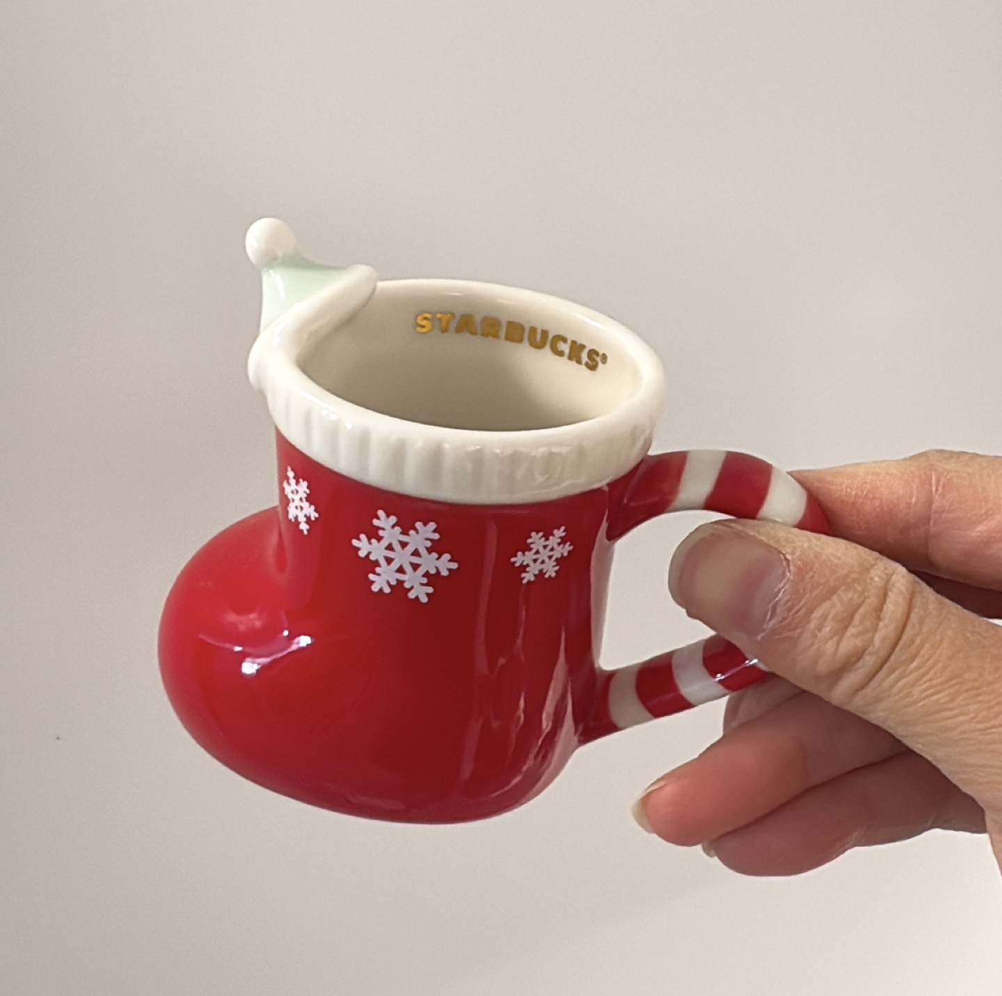 Starbucks Christmas cups and a plate