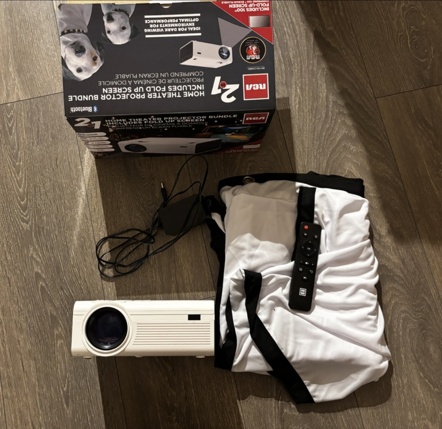 RCA 2-in-1 Home Theatre Projector Bundle with Foldable Screen