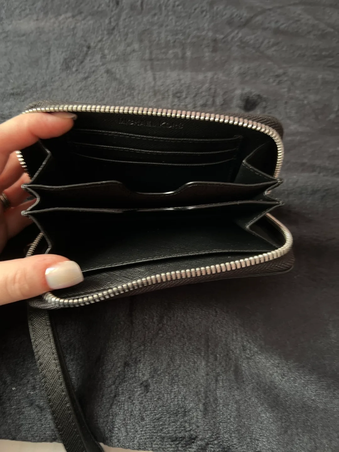 Michael Kors Black and White Stripe Zip Around Wallet image indicator(2)