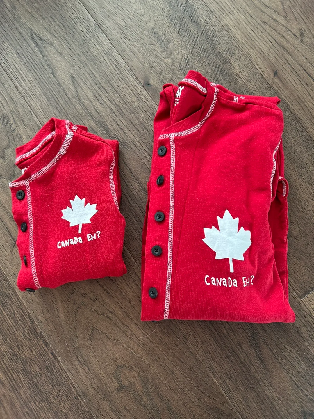 $5 for both! Like New Matching Canada Onsie (size adult S & 4T) image indicator(7)