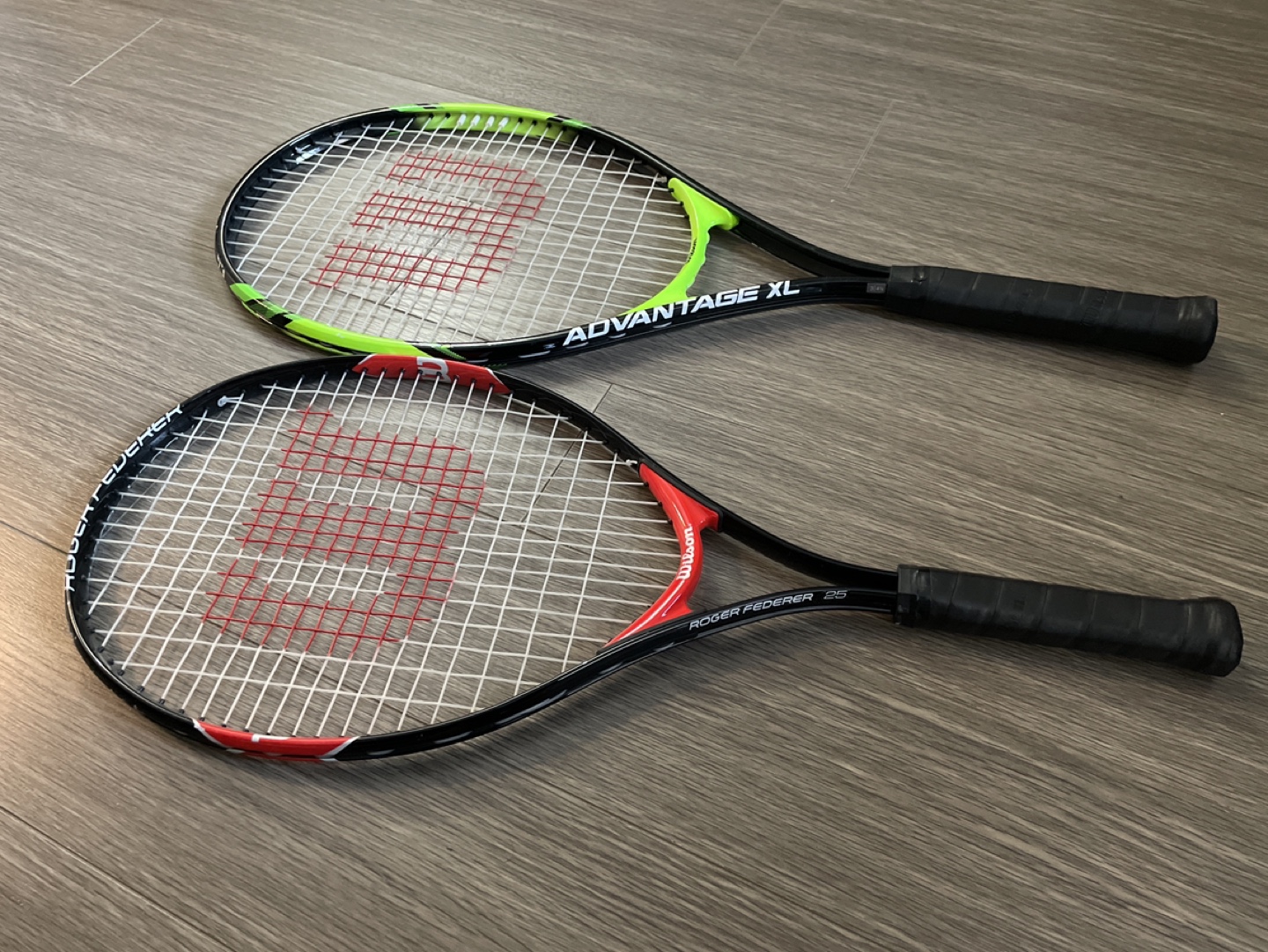 Two Wilson Tennis Rackets (boy and dad)