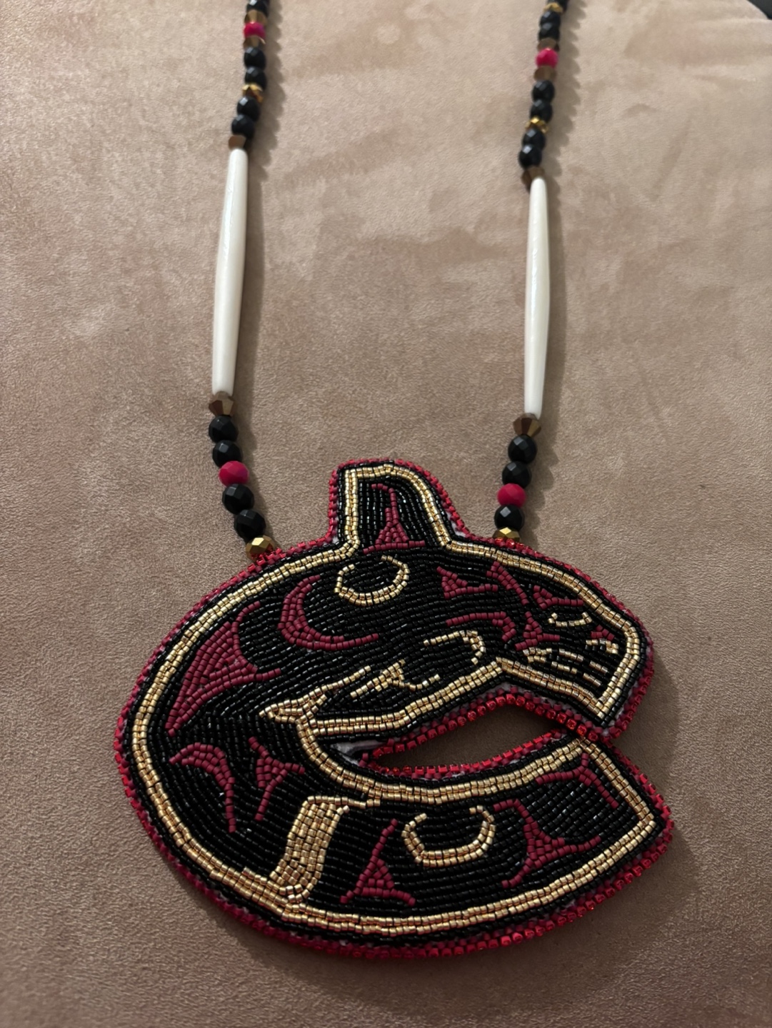 Beaded Canuck medallion