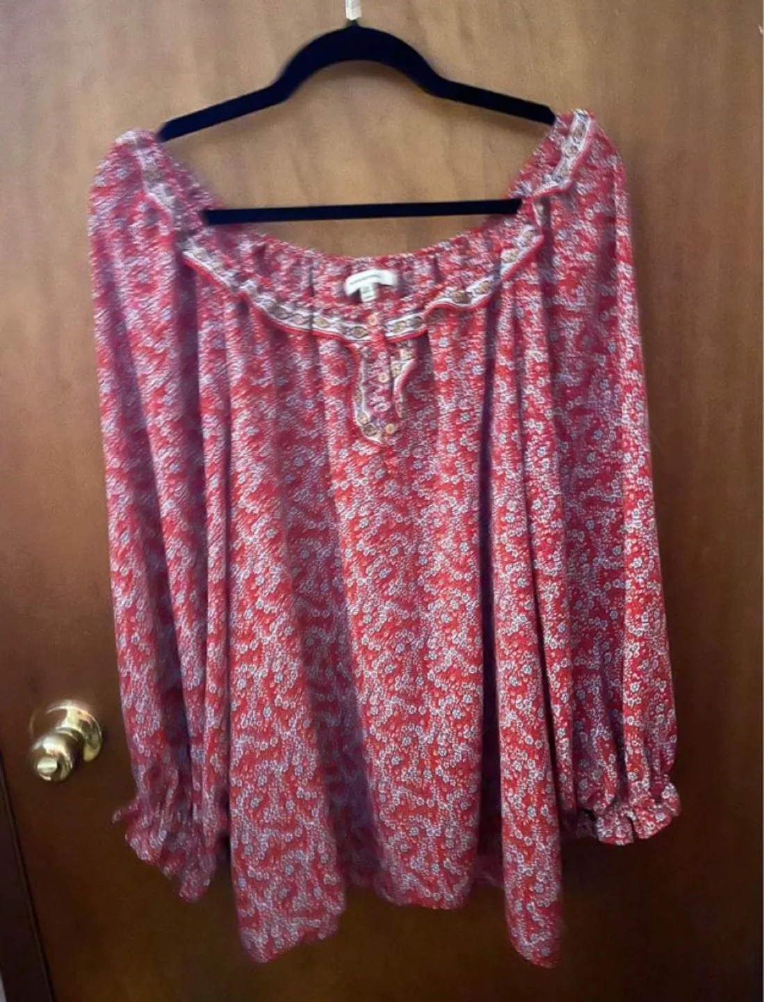 Red floral blouse with long sleeves