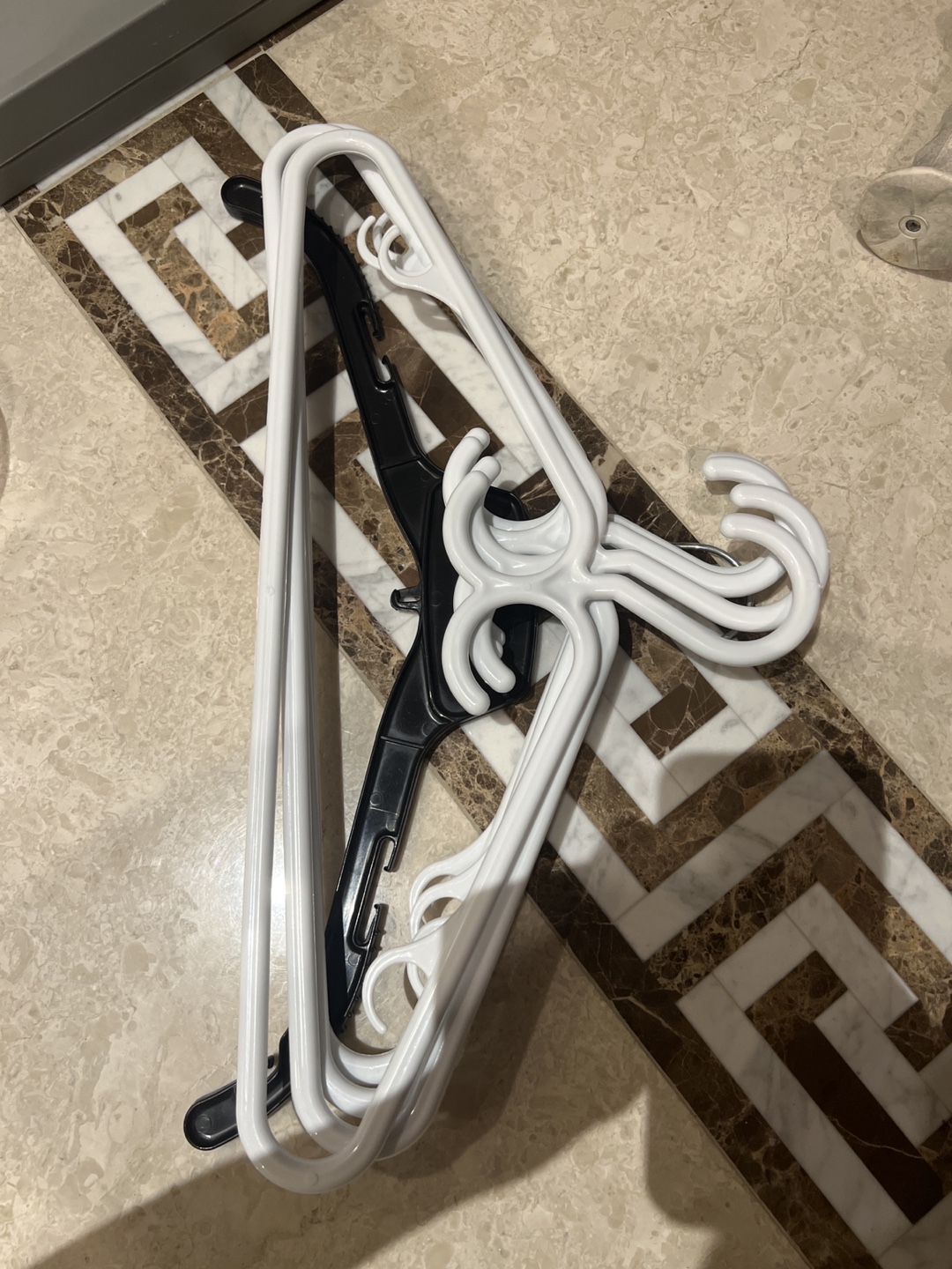 White and Black Plastic Hangers