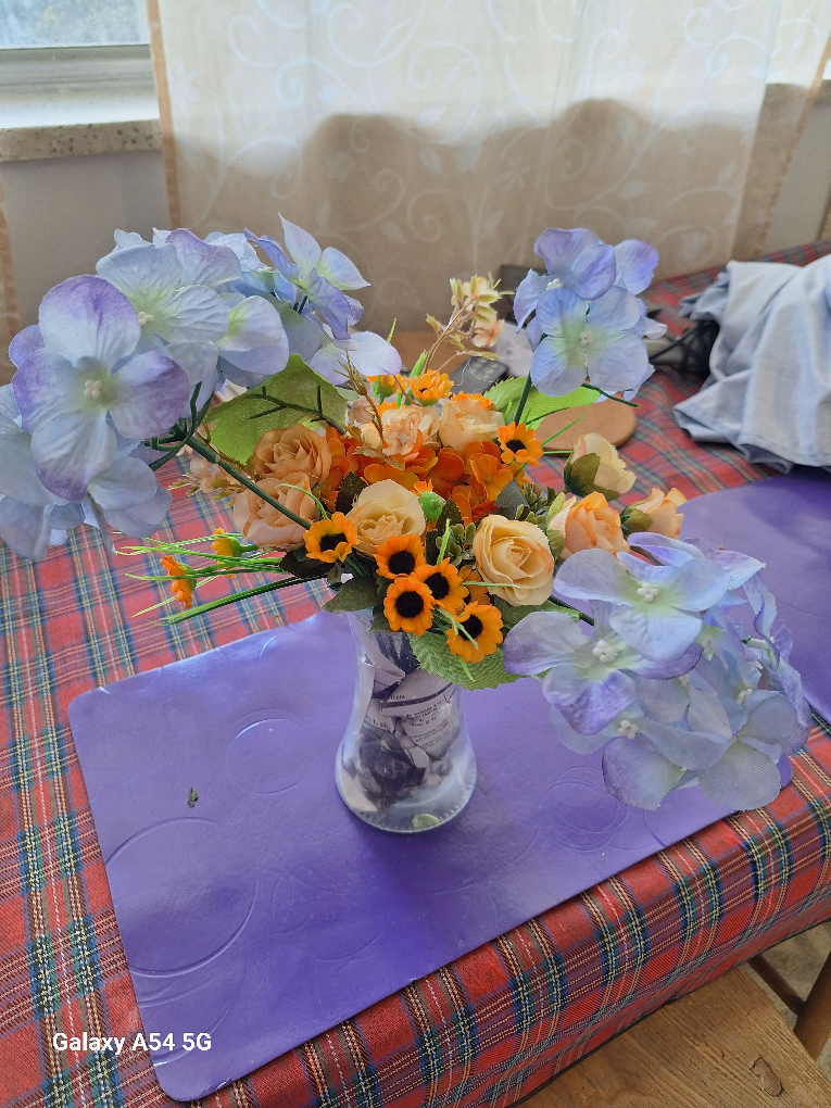 beautiful plastic flowers 🧡