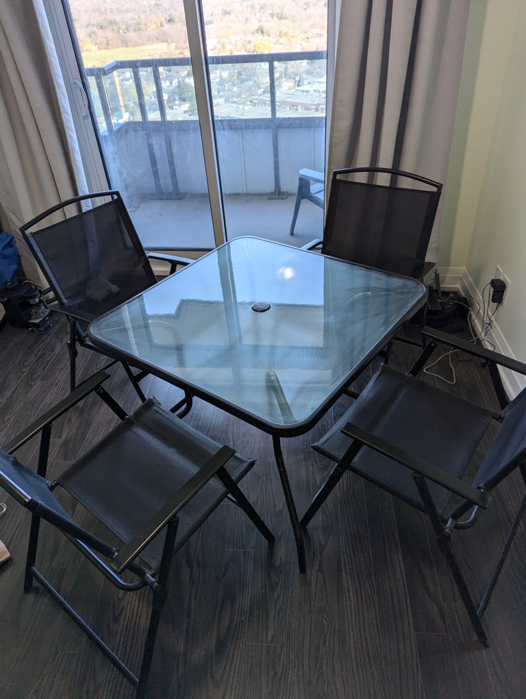 Glass Top Patio Table and Chairs
