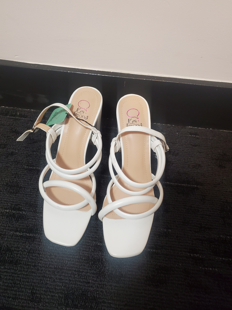 White heeled sandals