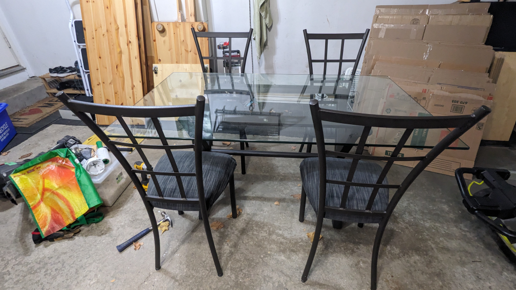 Glass dining table with four chairs - photo 2
