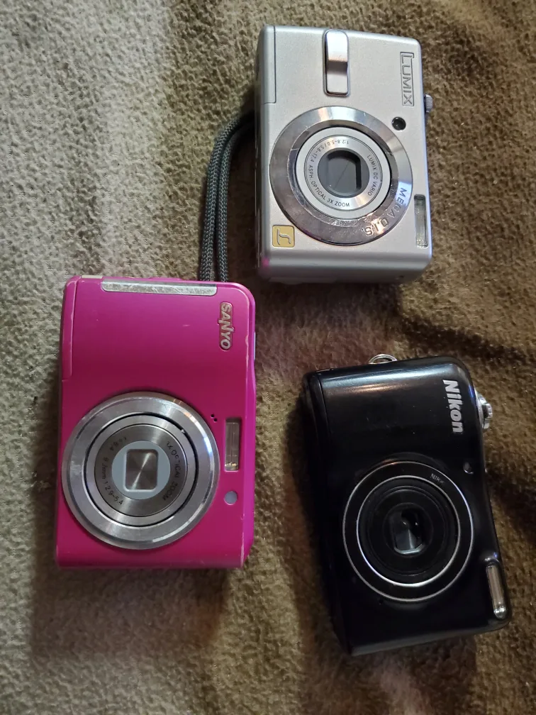 3 Digital Cameras - Panasonic, Nikon, Sanyo thumbnail