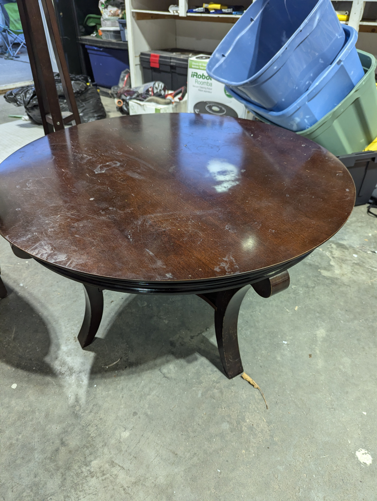 Round Coffee Table - dark wood, lightly stained