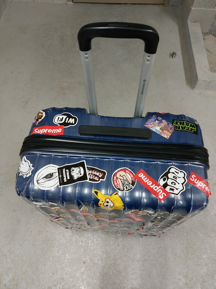 Blue Suitcase with Stickers