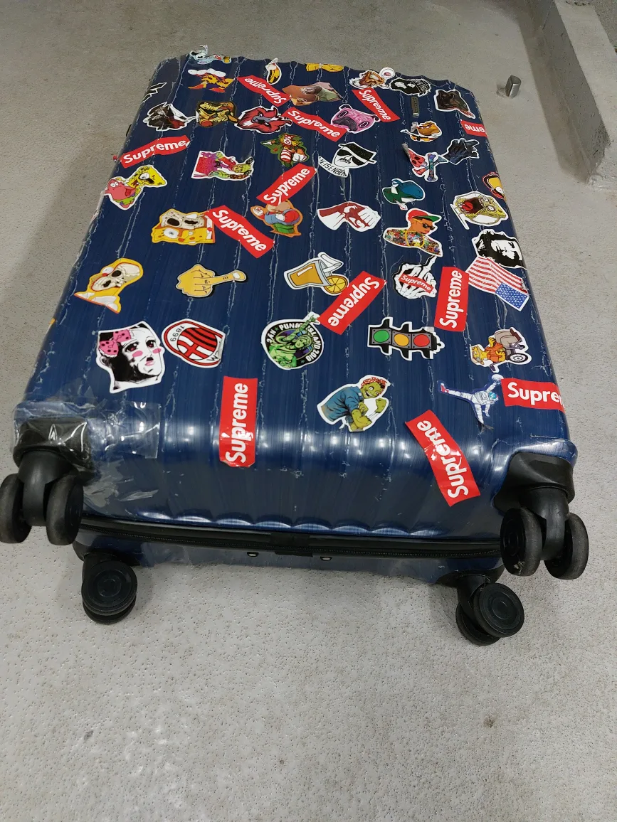 Blue Suitcase with Stickers image indicator(3)