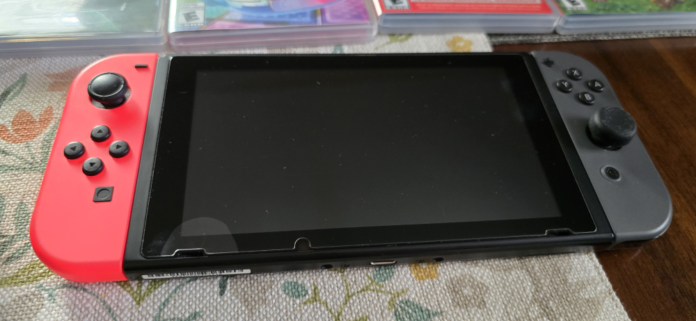 Nintendo Switch with Games and Accessories - photo 3