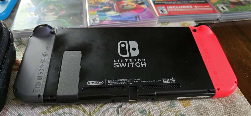 Nintendo Switch with Games and Accessories - photo 4