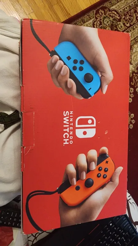 Nintendo Switch Console with Neon Blue and Neon Red Joy-Cons image indicator(2)