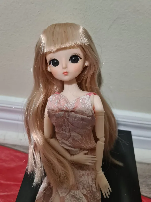 Articulated Doll with Strawberry Blonde Hair & inset glass eyes image indicator(7)