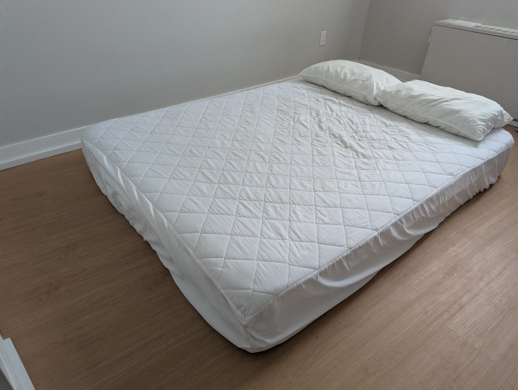 Mattress with topper and protector.