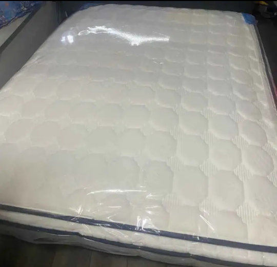 Queen Size Bed Mattress in plastic covering