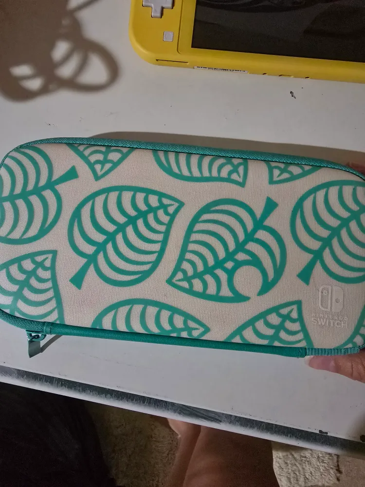 Yellow Nintendo Switch Lite with Animal Crossing Case image indicator(3)