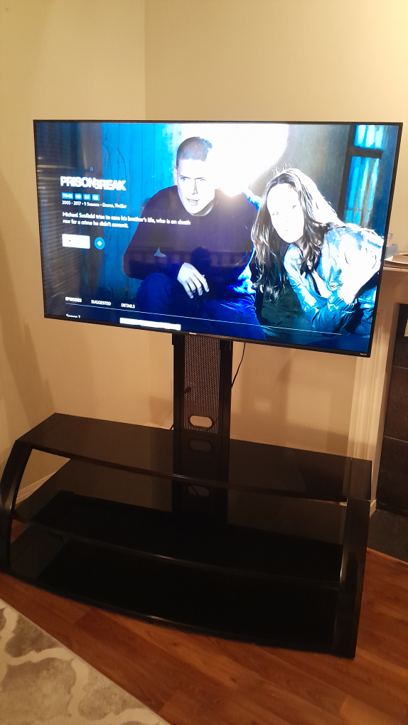 Black Glass TV Stand with 58 inche hisenseTV