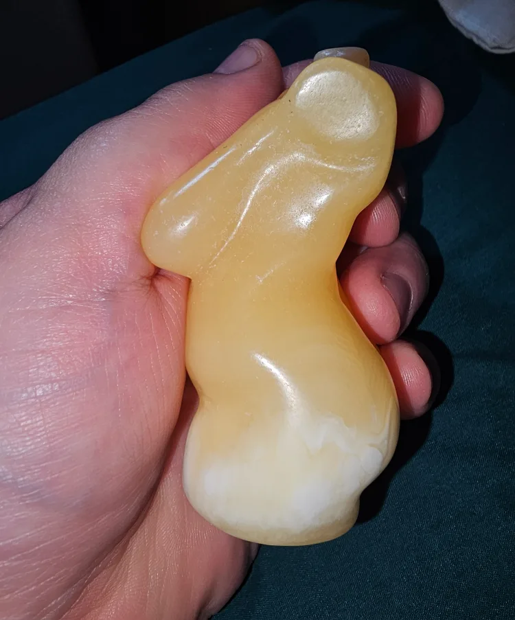 Orange calcite woman figure thumbnail