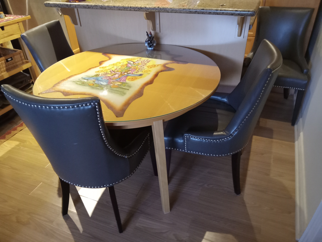 Round Dining Table with 4 Chairs. can be expanded to 6. with