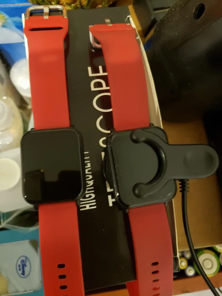 2 Smart Watches with Red Bands image indicator(3)