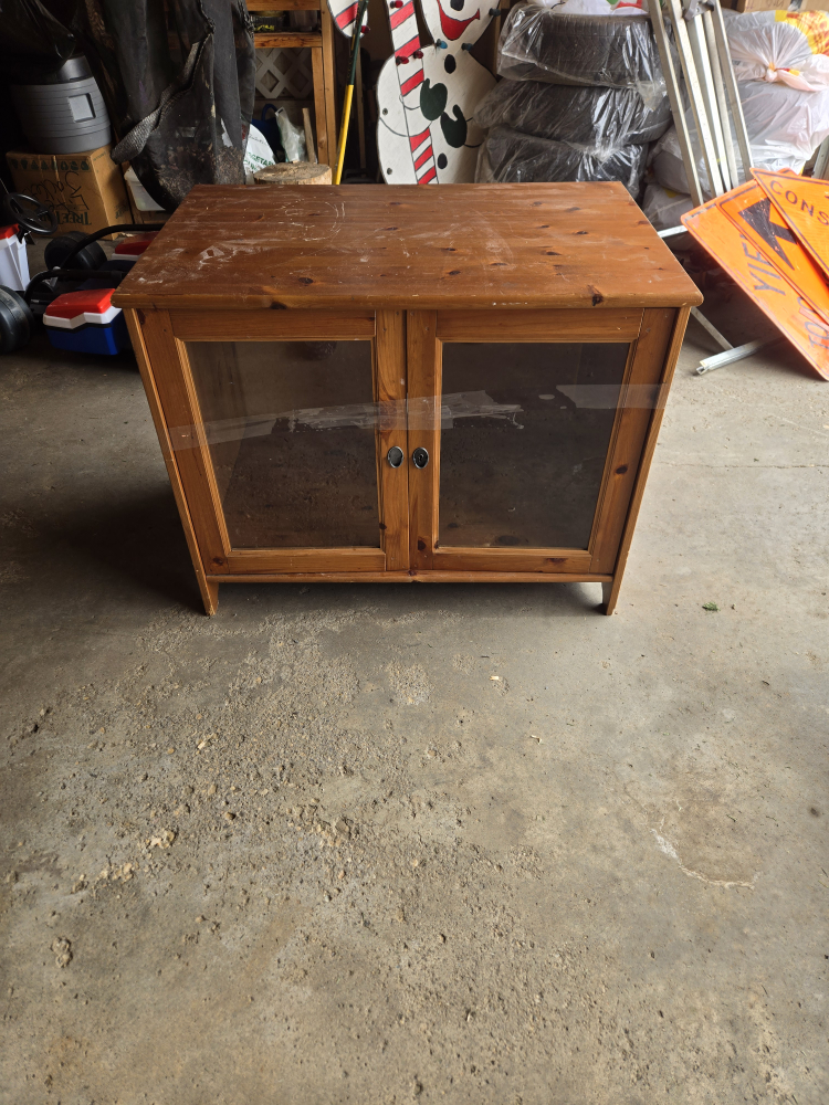 Wooden cabinet with glass doors