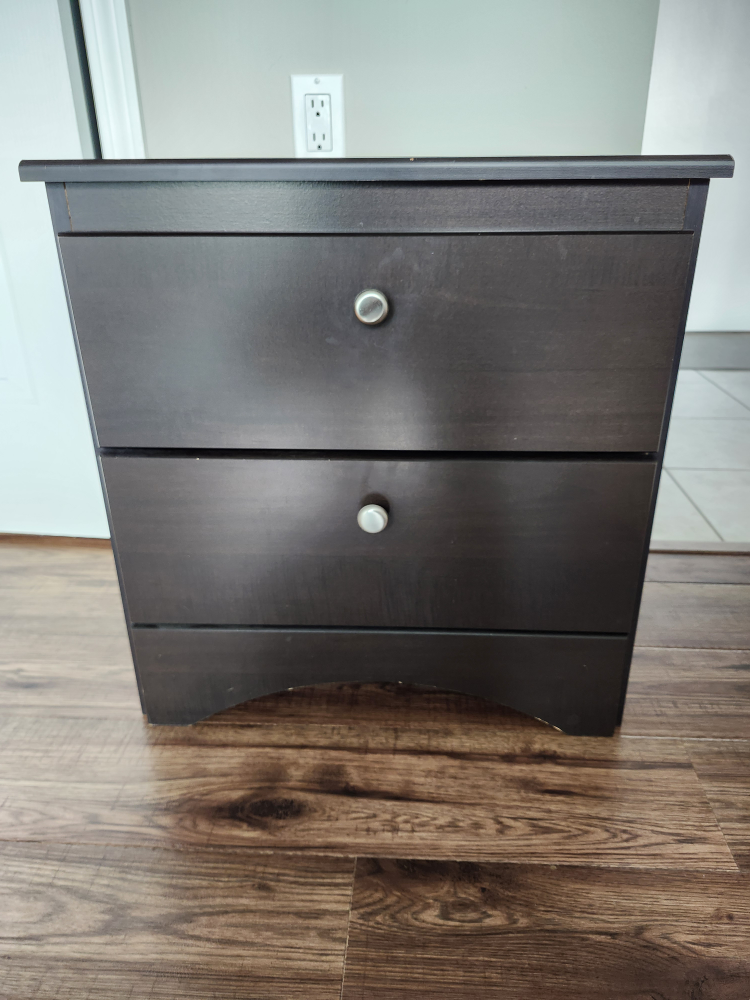 Dark brown nightstand with two drawers