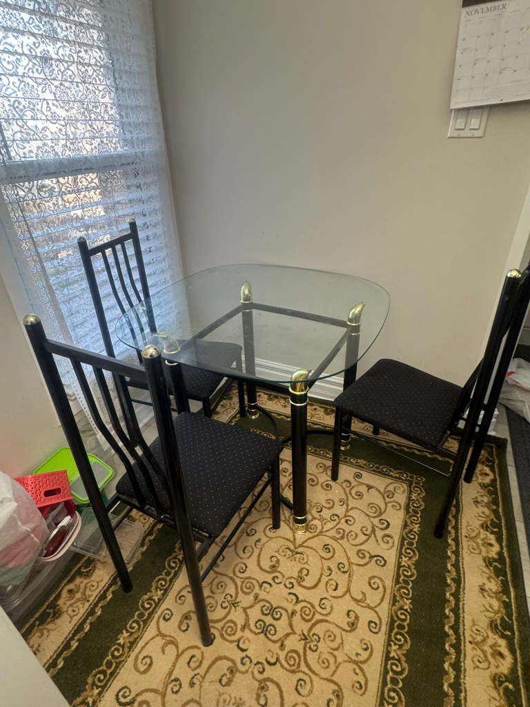 Glass top dining table set With 4 Chairs