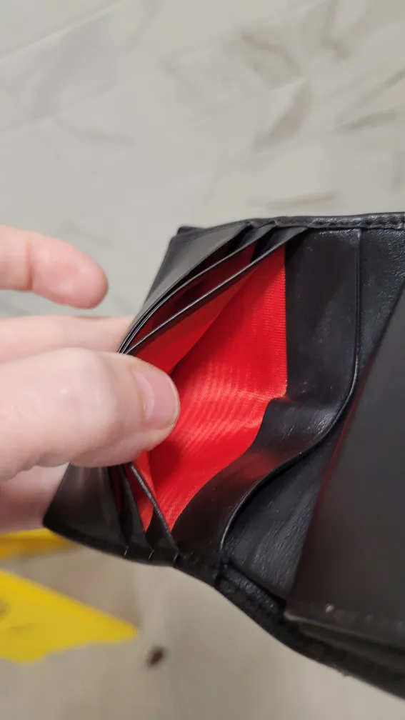 Authentic Christian Louboutin Spiked Wallet image indicator(6)