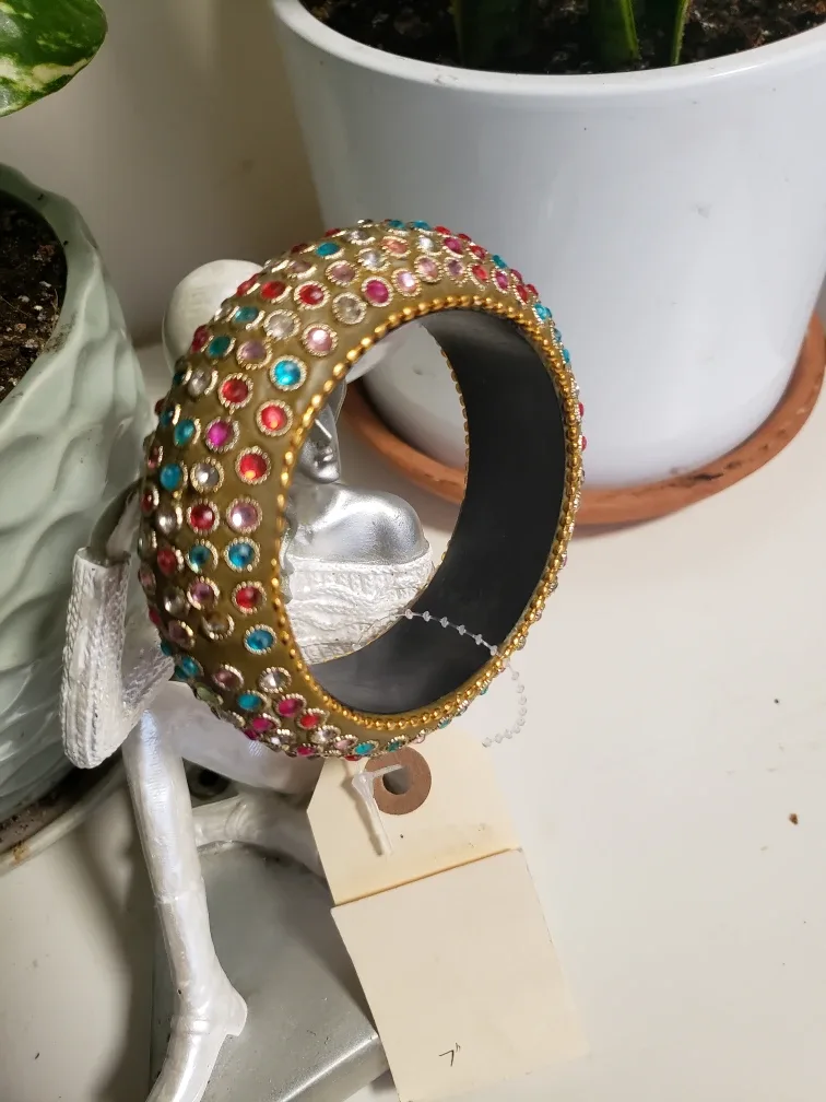 size 7 beautiful gold toned Bangle with multicolored Gemstones image indicator(4)