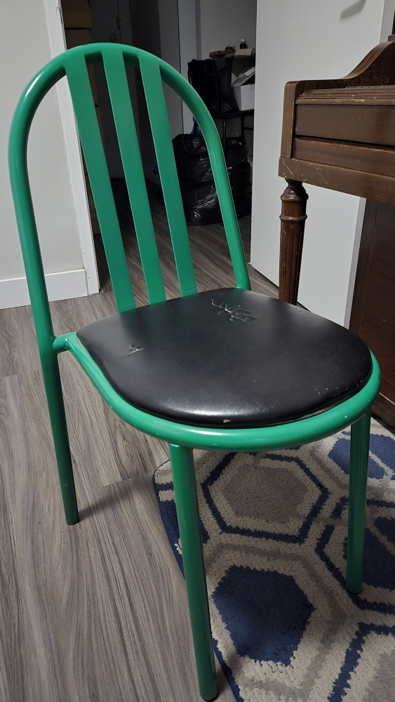 Green Metal Chair with Black Padded Seat