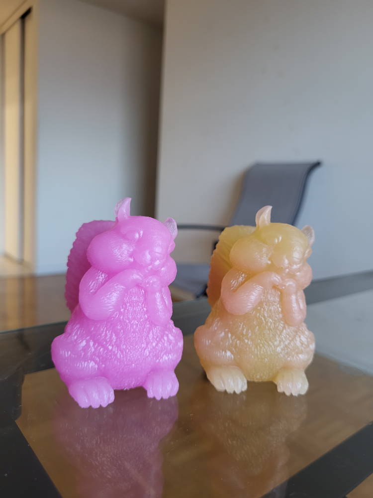 Two Squirrel Figurines