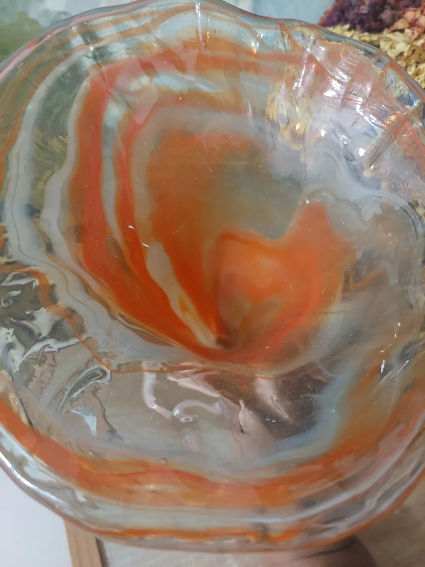 Orange glass decor and glass vase with dried flowers. image indicator(3)