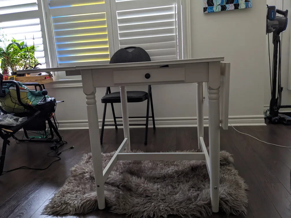 IKEA Drop-leaf table, dining table with a rug (photo) image indicator(3)