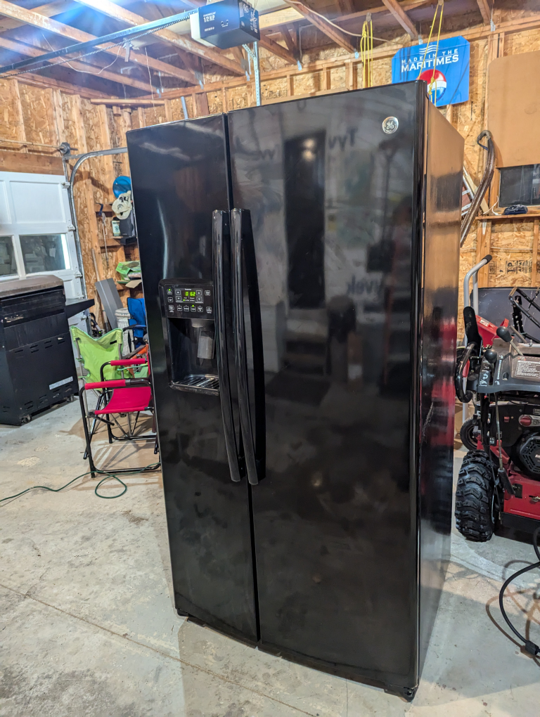 GE Side-by-Side Refrigerator - photo 2
