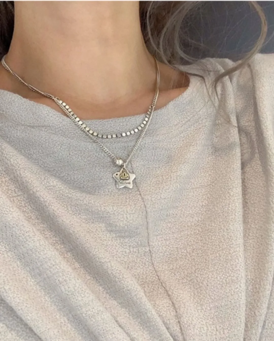 Silver Necklace with a star pendent image indicator(2)