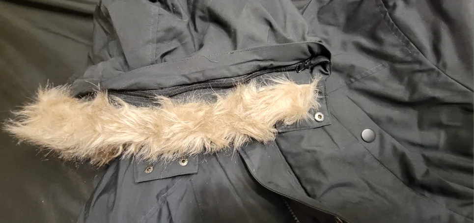 Black winter parka with faux fur hood. image indicator(8)