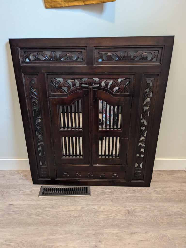 Intricately Carved Wooden Mirror