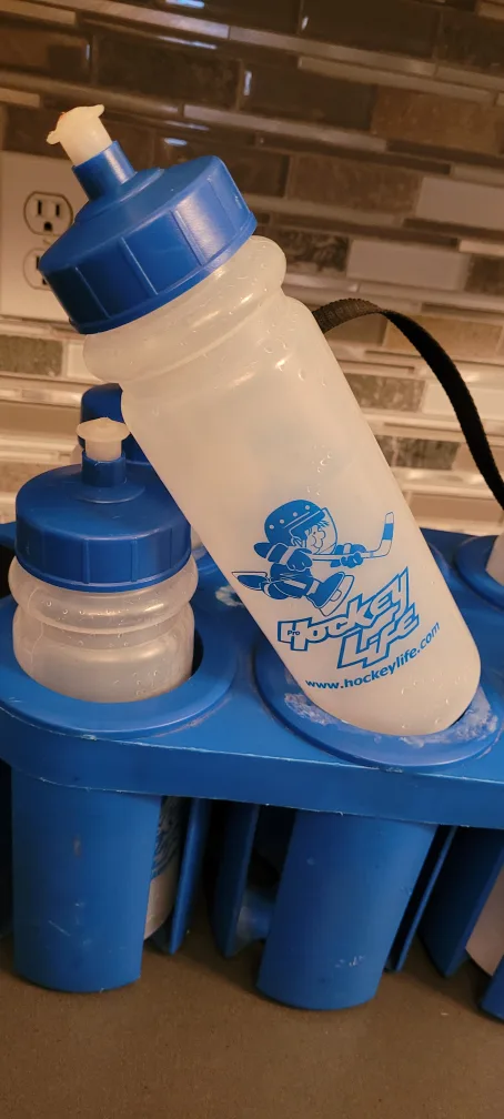 Hockey Life Water Bottle Carrier holds bottles and pucks image indicator(2)
