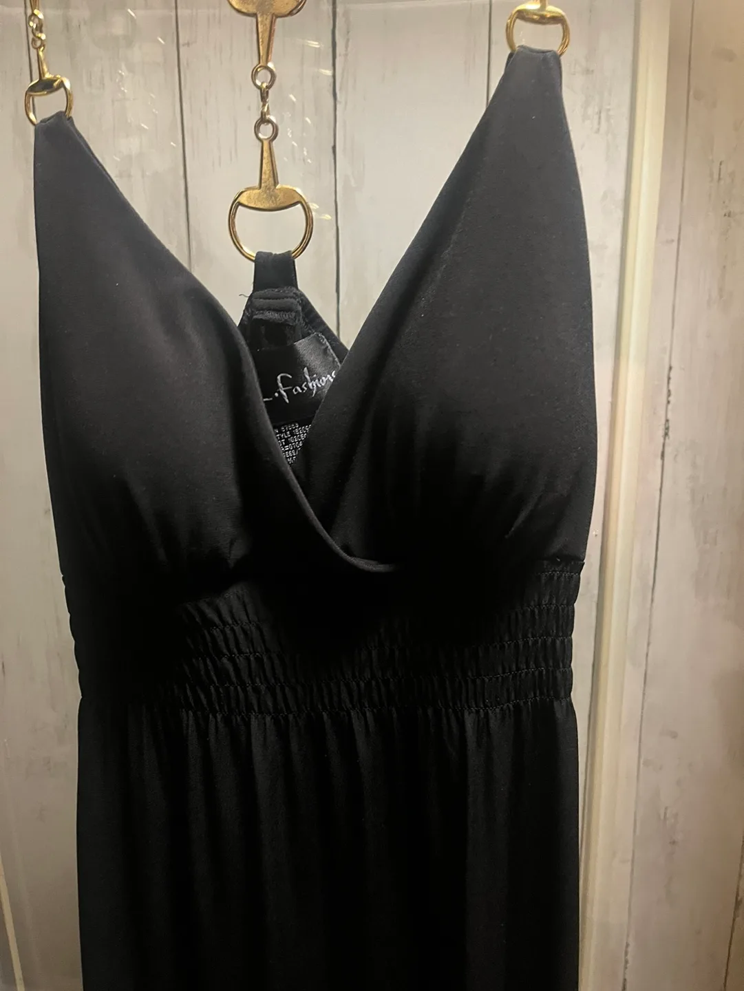 Black gown with gold accents image indicator(5)