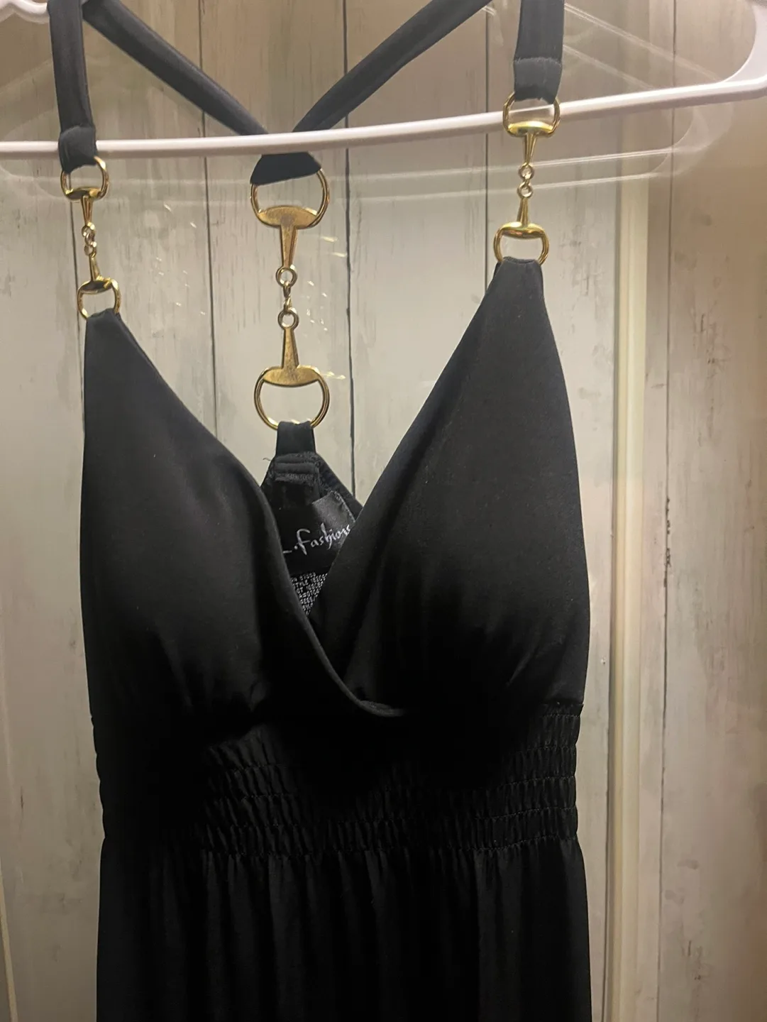 Black gown with gold accents image indicator(6)